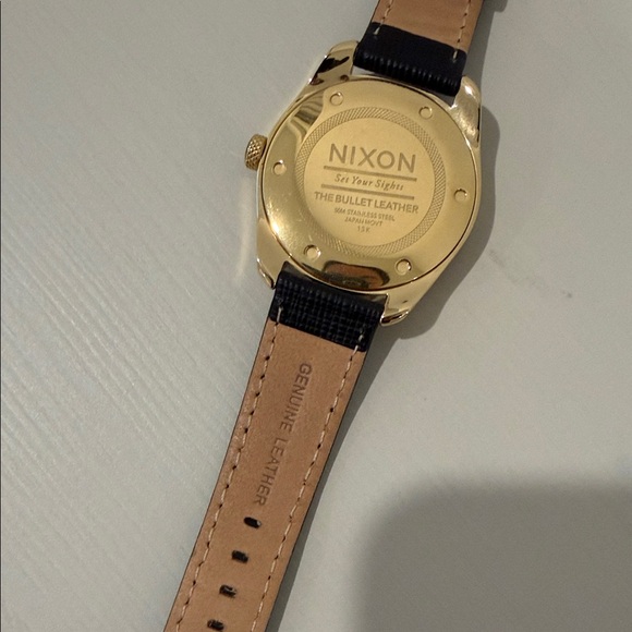 Nixon Black and Gold Watch